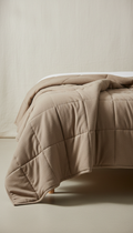 Weighted blanket with glass beads